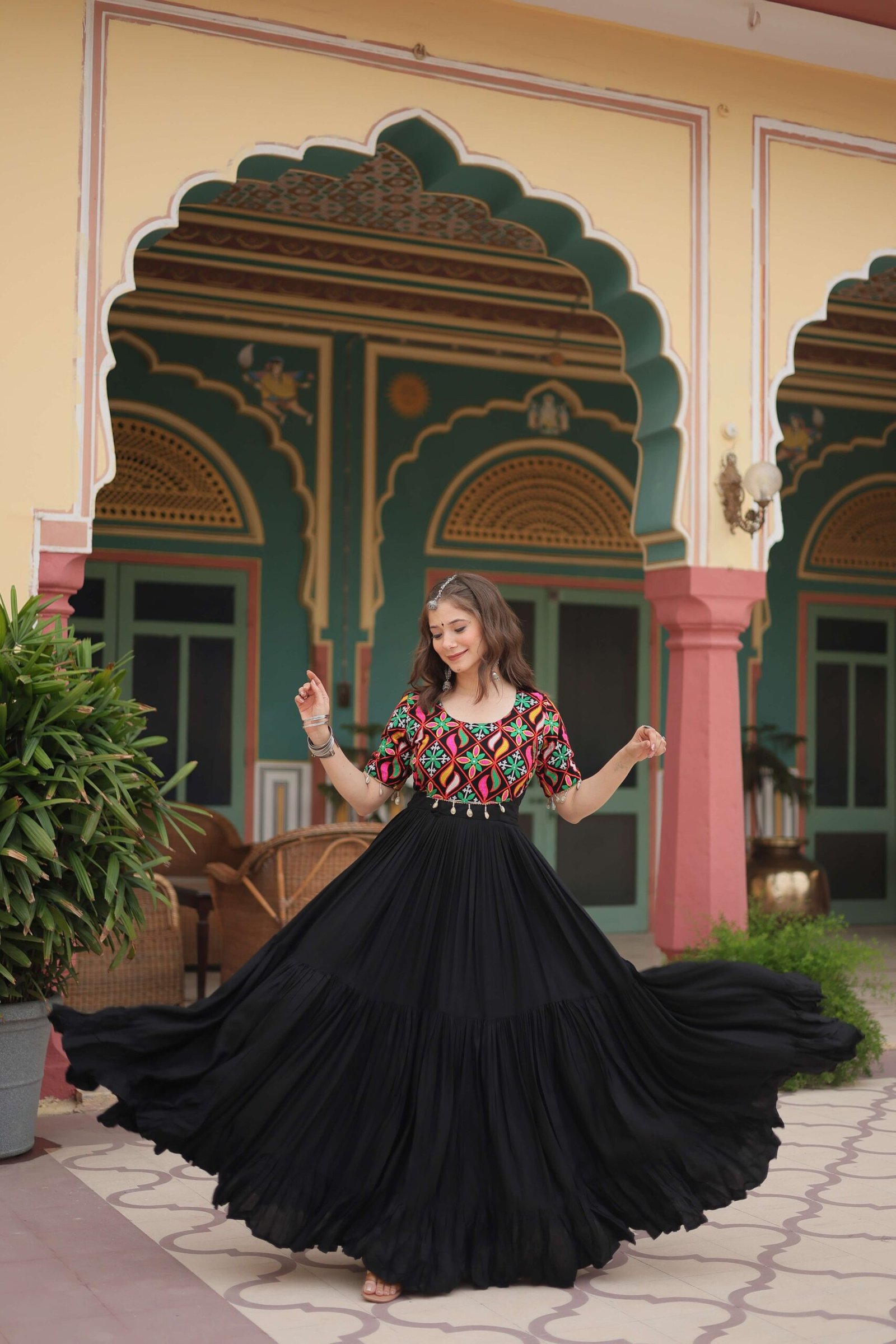 Black Elegant Kutchi Gamthi Work Reyon Gown with Heavy Flair